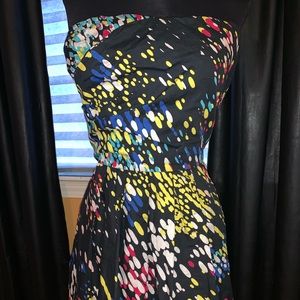 Strapless, multicolored mid length dress.